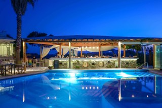 alkyoni beach hotel pool by night